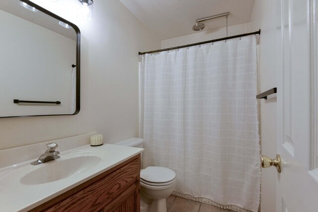 418 E Covington Rd, Willard, MO 65781 - bathroom featuring toilet, vanity, tile patterned flooring, and a shower with curtain