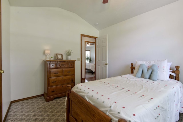 418 E Covington Rd, Willard, MO 65781 - bedroom with vaulted ceiling, baseboards, dark colored carpet, and a ceiling fan