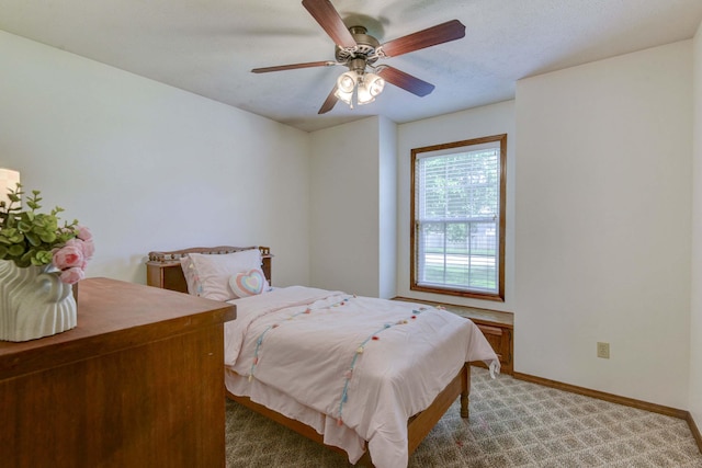 418 E Covington Rd, Willard, MO 65781 - bedroom featuring light carpet, baseboards, and a ceiling fan