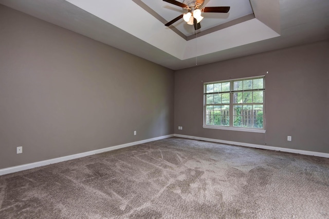 1214 Evington Ct, Springfield, MO 65803 - carpeted empty room featuring a ceiling fan, baseboards, and a raised ceiling
