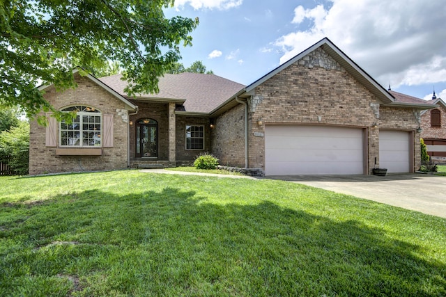 1214 Evington Ct, Springfield, MO 65803 - view of front of house with brick siding, an attached garage, and a front yard
