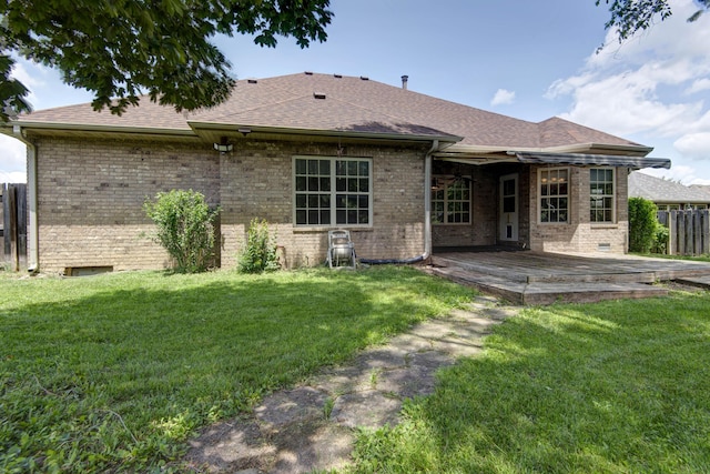 1214 Evington Ct, Springfield, MO 65803 - rear view of house featuring brick siding, a wooden deck, and roof with shingles