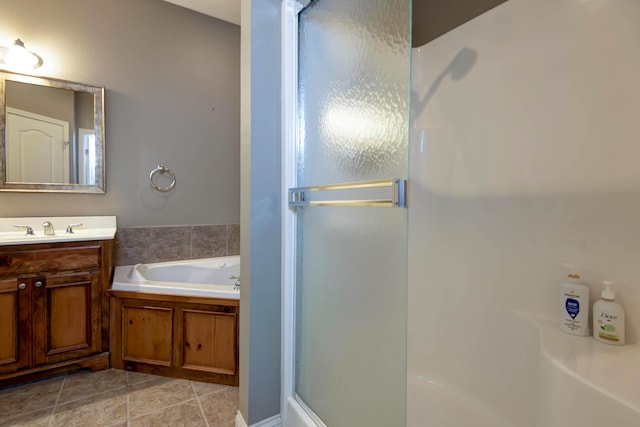 1214 Evington Ct, Springfield, MO 65803 - full bathroom featuring a garden tub, an enclosed shower, vanity, and tile patterned flooring