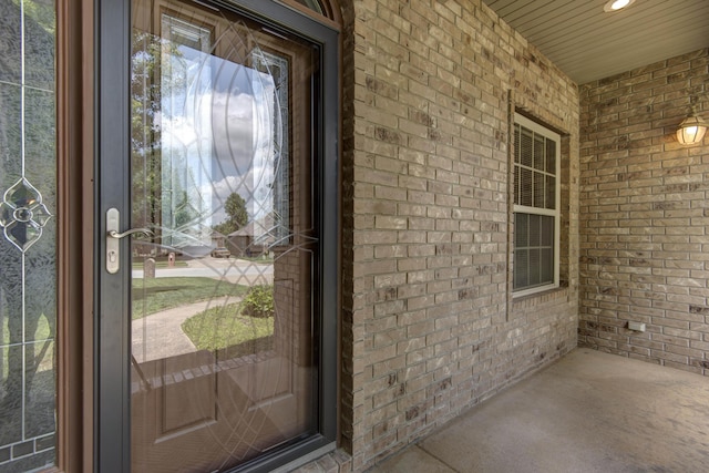1214 Evington Ct, Springfield, MO 65803 - view of exterior entry with brick siding and covered porch