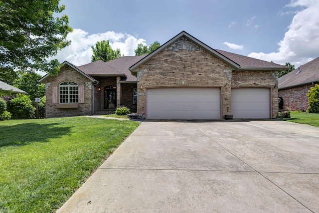 1214 Evington Ct, Springfield, MO 65803 - ranch-style house featuring concrete driveway, brick siding, and a front yard