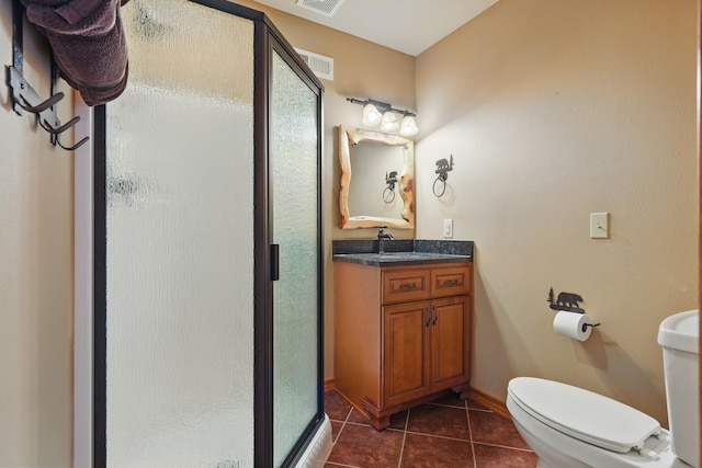 1041 Skyview Dr, Branson, MO 65616 - bathroom with a stall shower, vanity, tile patterned flooring, toilet, and baseboards