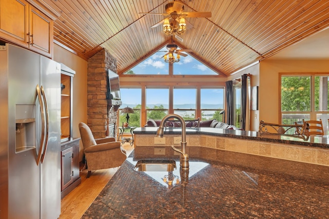1041 Skyview Dr, Branson, MO 65616 - kitchen featuring stainless steel refrigerator with ice dispenser, a sink, wooden ceiling, ceiling fan, and lofted ceiling
