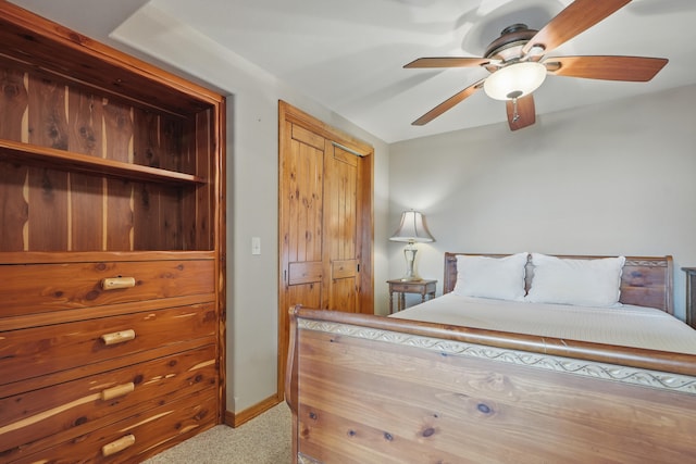 1041 Skyview Dr, Branson, MO 65616 - bedroom with carpet flooring, baseboards, a ceiling fan, and a closet