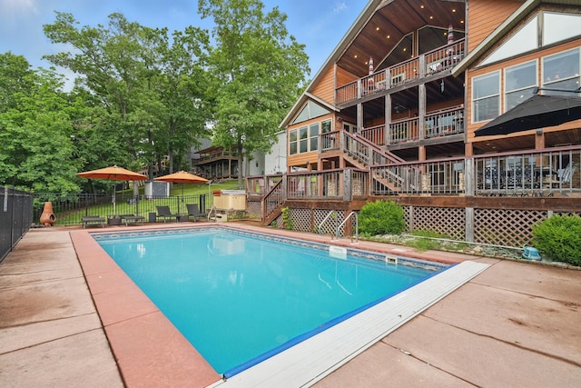 1041 Skyview Dr, Branson, MO 65616 - view of swimming pool featuring stairway and a patio