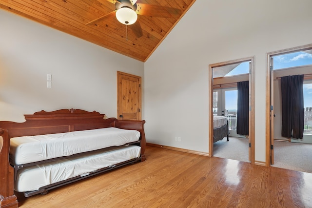 1041 Skyview Dr, Branson, MO 65616 - bedroom with wood finished floors, baseboards, wooden ceiling, and high vaulted ceiling