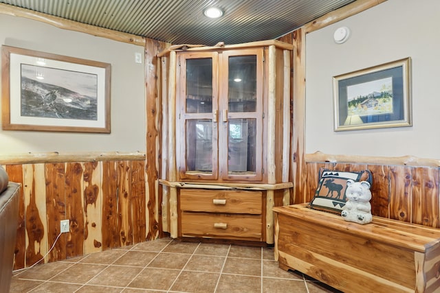 1041 Skyview Dr, Branson, MO 65616 - detailed view of a smoke detector, wooden walls, and wainscoting