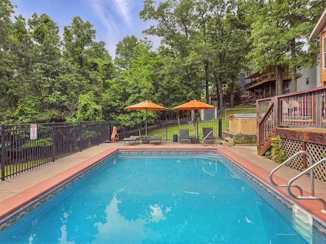 1041 Skyview Dr, Branson, MO 65616 - view of swimming pool featuring a deck and a patio area