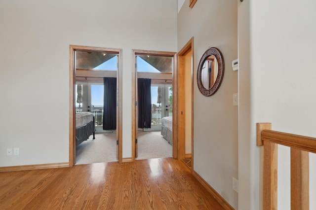 1041 Skyview Dr, Branson, MO 65616 - hallway with wood finished floors and baseboards