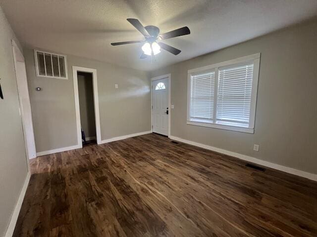 1217 Blair St, Cabool, MO 65689 - entrance foyer featuring dark wood-style floors, baseboards, and a ceiling fan