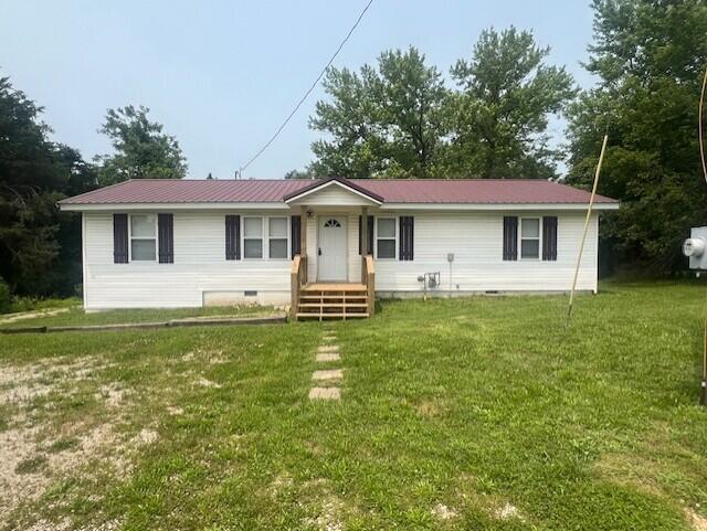 1217 Blair St, Cabool, MO 65689 - ranch-style house with crawl space, a front lawn, and metal roof