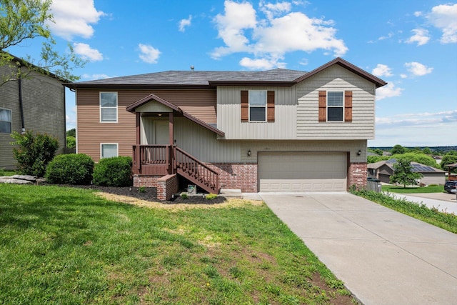 1311 Nitro Dr, Ozark, MO 65721 - raised ranch featuring brick siding, a garage, a front lawn, and driveway