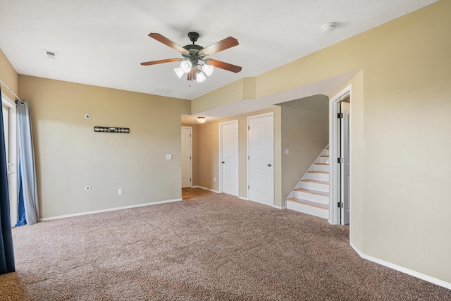 1311 Nitro Dr, Ozark, MO 65721 - carpeted empty room featuring a smoke detector, ceiling fan, baseboards, and stairway