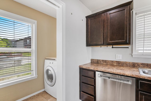 1311 Nitro Dr, Ozark, MO 65721 - washroom featuring washer / clothes dryer, healthy amount of natural light, and baseboards