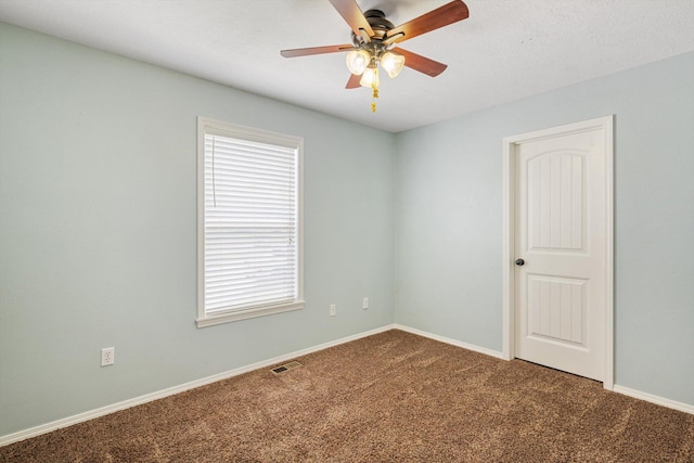 1311 Nitro Dr, Ozark, MO 65721 - carpeted spare room featuring a ceiling fan and baseboards