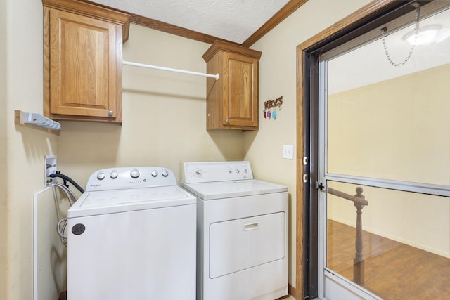 323 Shadrack Rd, Cape Fair, MO 65624 - washroom with independent washer and dryer, cabinet space, and a textured ceiling