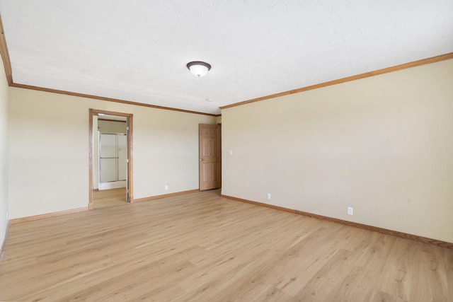 323 Shadrack Rd, Cape Fair, MO 65624 - unfurnished room with light wood-style floors, baseboards, and ornamental molding
