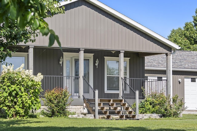 323 Shadrack Rd, Cape Fair, MO 65624 - view of front of home featuring a porch, a garage, and roof with shingles