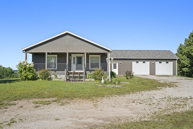 323 Shadrack Rd, Cape Fair, MO 65624 - view of front of house featuring a porch, a front lawn, driveway, and an attached garage