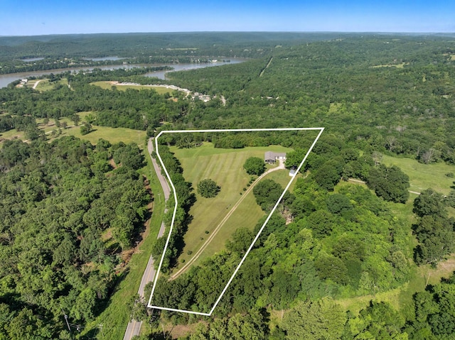 323 Shadrack Rd, Cape Fair, MO 65624 - aerial view of property's location with a heavily wooded area, property parcel outlined, and a nearby body of water