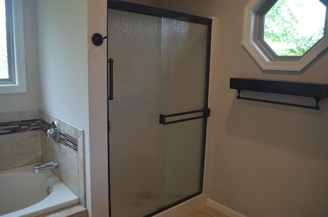 532 Holiday St, Highlandville, MO 65669 - bathroom featuring a shower stall and a bath