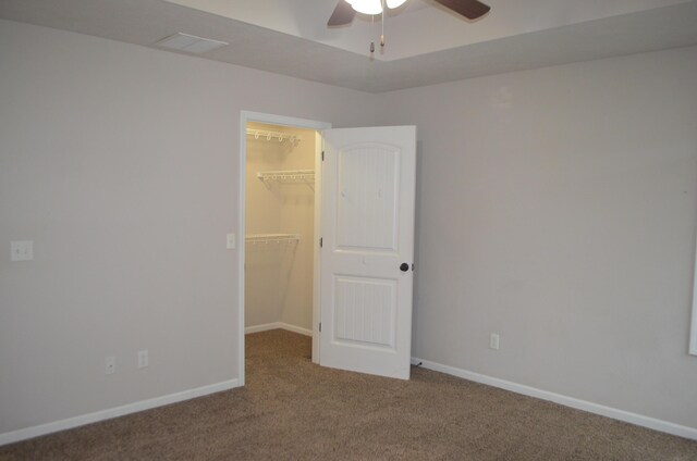 532 Holiday St, Highlandville, MO 65669 - unfurnished bedroom with carpet flooring, a spacious closet, a closet, and baseboards