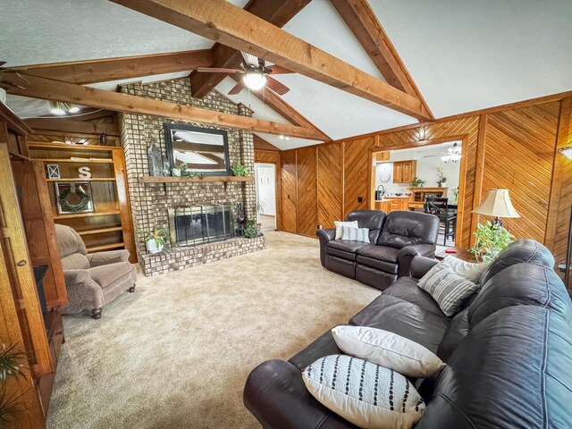 5350 E Farm Road 168, Rogersville, MO 65742 - living area featuring ceiling fan, wooden walls, carpet floors, and a brick fireplace