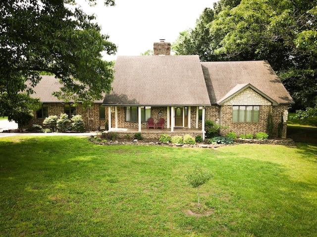 5350 E Farm Road 168, Rogersville, MO 65742 - view of front of property featuring a chimney, a front lawn, a porch, and brick siding