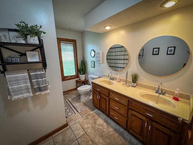 5350 E Farm Road 168, Rogersville, MO 65742 - bathroom featuring baseboards, double vanity, and toilet