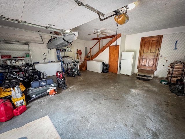 5350 E Farm Road 168, Rogersville, MO 65742 - garage featuring freestanding refrigerator and a garage door opener