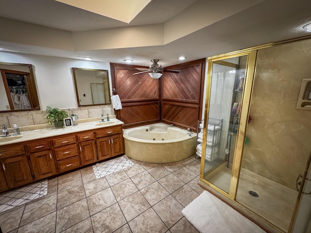 5350 E Farm Road 168, Rogersville, MO 65742 - full bathroom with a shower stall, a jetted tub, double vanity, a ceiling fan, and decorative backsplash