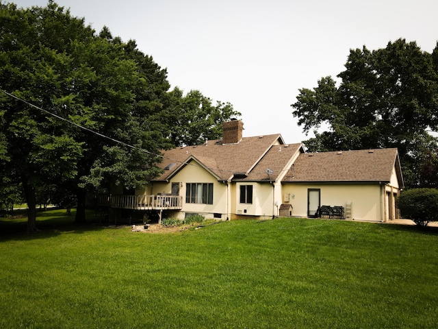 5350 E Farm Road 168, Rogersville, MO 65742 - rear view of property featuring a lawn, a chimney, a wooden deck, and stucco siding