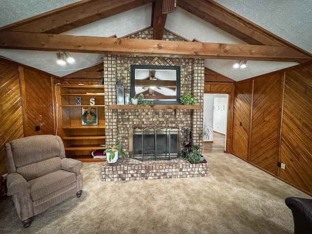 5350 E Farm Road 168, Rogersville, MO 65742 - living room with wood walls, a fireplace, carpet floors, and a textured ceiling