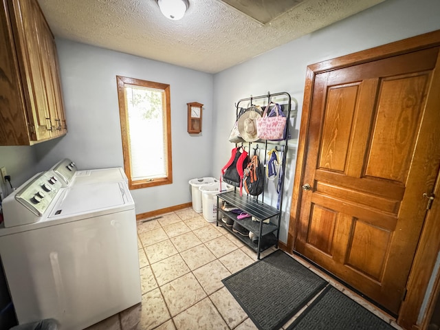 5350 E Farm Road 168, Rogersville, MO 65742 - washroom with cabinet space, separate washer and dryer, a textured ceiling, and baseboards