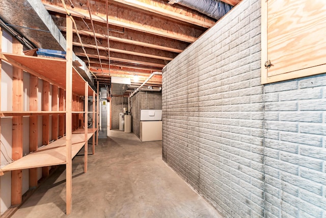 315 Rock Ridge Rd, Branson West, MO 65737 - unfinished basement with a water softener and fridge