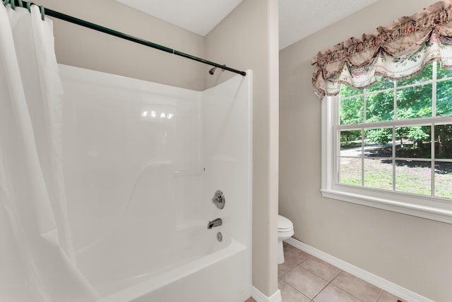 315 Rock Ridge Rd, Branson West, MO 65737 - bathroom with tile patterned floors, toilet, shower / bath combo, and baseboards