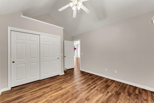 315 Rock Ridge Rd, Branson West, MO 65737 - unfurnished bedroom with lofted ceiling, wood finished floors, baseboards, a closet, and ceiling fan
