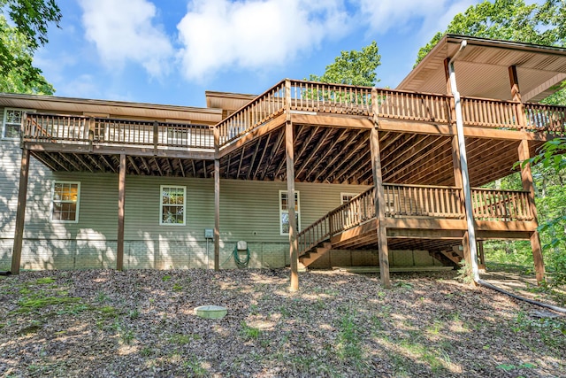 315 Rock Ridge Rd, Branson West, MO 65737 - rear view of property featuring a deck and stairs