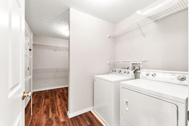 315 Rock Ridge Rd, Branson West, MO 65737 - laundry area with washer and dryer, wood finished floors, a textured ceiling, and baseboards