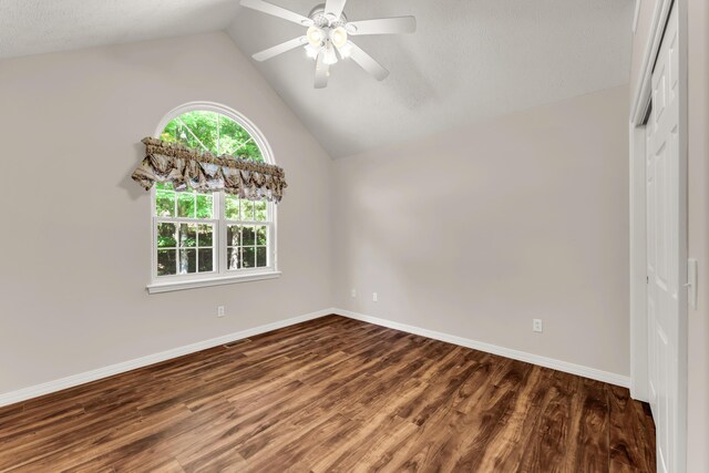 315 Rock Ridge Rd, Branson West, MO 65737 - unfurnished room with baseboards, lofted ceiling, ceiling fan, and dark wood finished floors