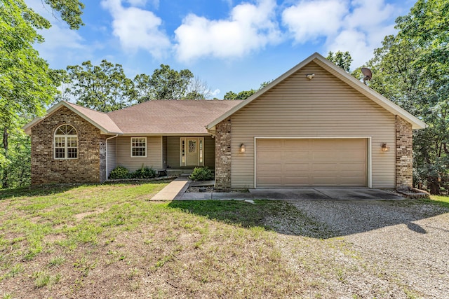 315 Rock Ridge Rd, Branson West, MO 65737 - ranch-style house with gravel driveway, an attached garage, a front yard, brick siding, and a shingled roof