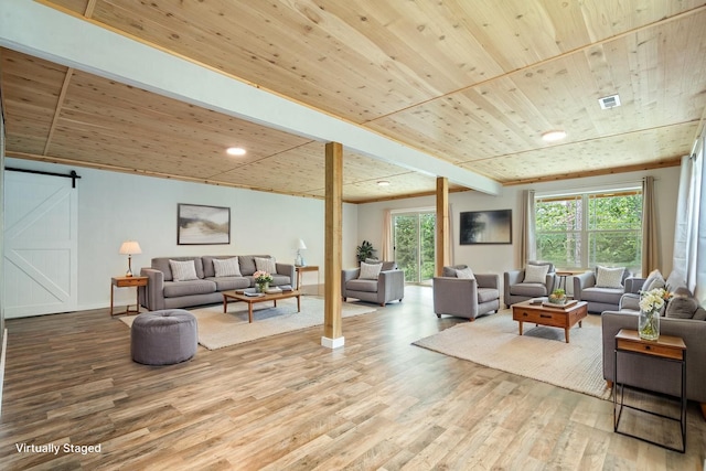 343 Cedar Glade Dr, Branson West, MO 65737 - living area with a barn door, wood ceiling, wood finished floors, baseboards, and recessed lighting