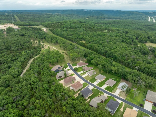 343 Cedar Glade Dr, Branson West, MO 65737 - aerial perspective of suburban area featuring a forest