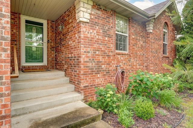 2304 S 12th St, Ozark, MO 65721 - view of exterior entry featuring brick siding