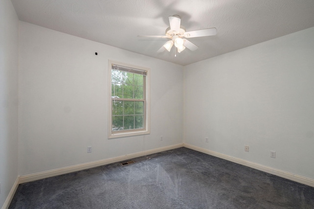 2304 S 12th St, Ozark, MO 65721 - unfurnished room with dark carpet, ceiling fan, and baseboards