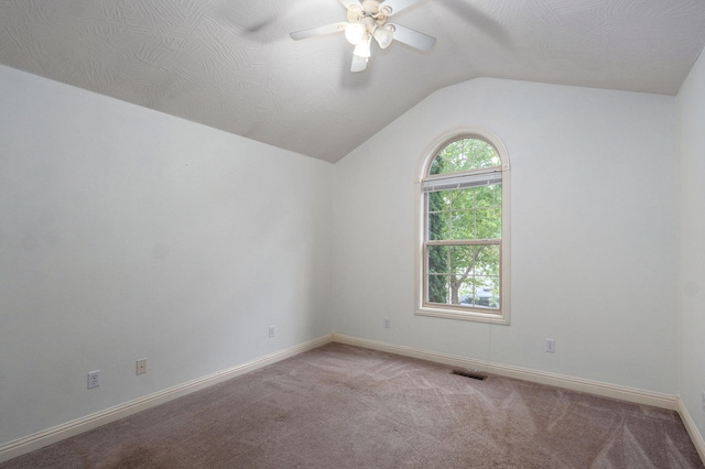 2304 S 12th St, Ozark, MO 65721 - spare room featuring a ceiling fan, light carpet, lofted ceiling, and baseboards